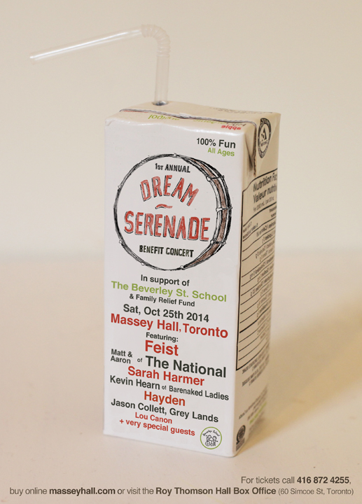 Dream Serenade logo and concert details printed on a drinking box