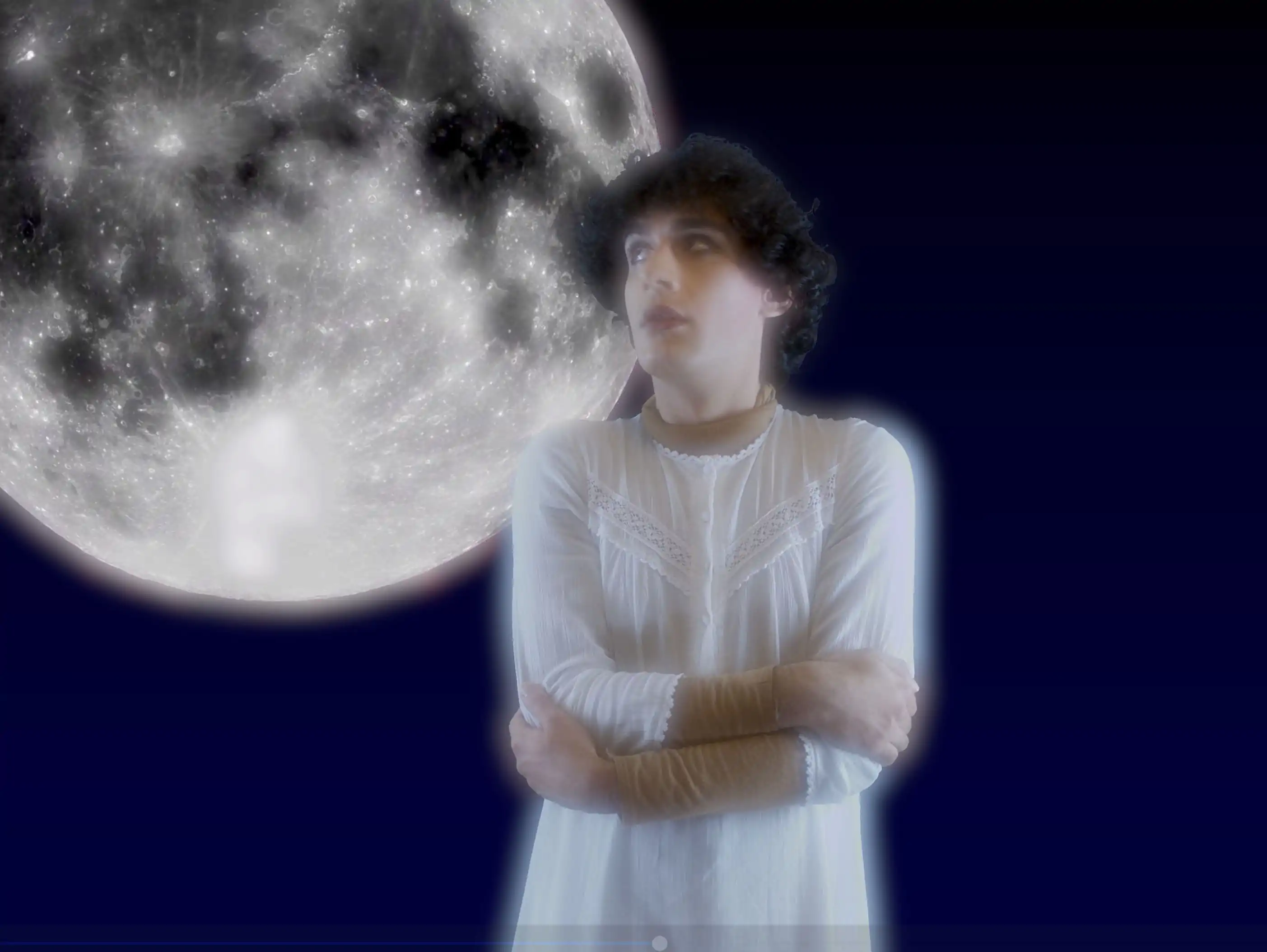 WA in a white dress with the moon looming behind them, it's okay, it's just the moon, it's not going to fall