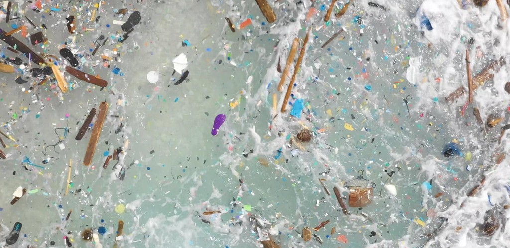 Photo of plastic waste floating in the ocean