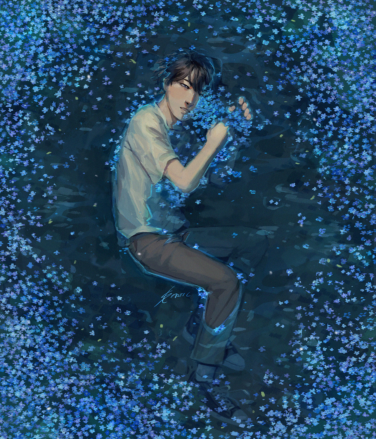 A boy half submerged in water surrounded by forget-me-nots.