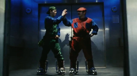A shot from the Super Mario Bros. movie, showing the jump suit costumes that both Mario and Luigi wear A shot from the Super Mario Bros. movie, showing the jump suit costumes that both Mario and Luigi wear