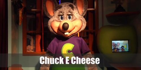 Chuck E Cheese’s is a light gray mouse who loves to wear a purple shirt with green trimmings and a big yellow ‘C’ in the middle.
