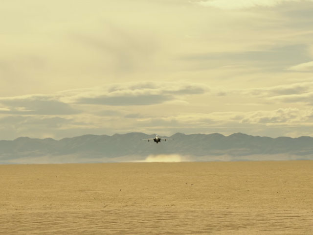 A single jet flying at Mach speeds in Top Gun Maverick