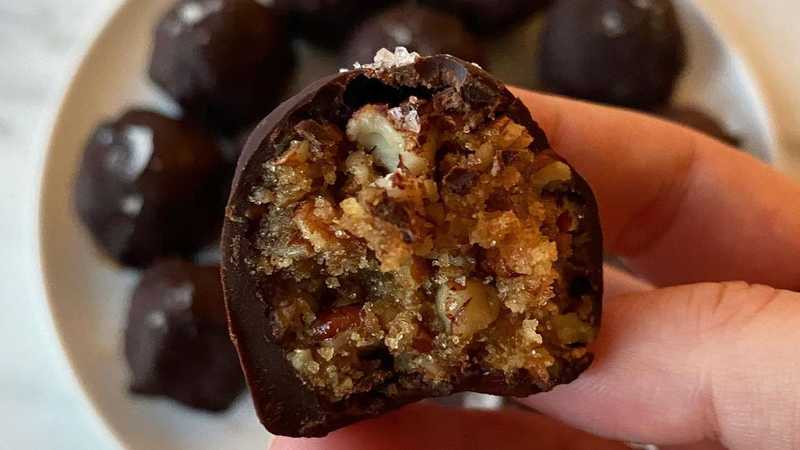 photo of completed recipe: These excellent truffles capture the rich flavor of pecan pie but in the perfect smaller bite. This is lightly adapted from the NYT Cooking recipe with…