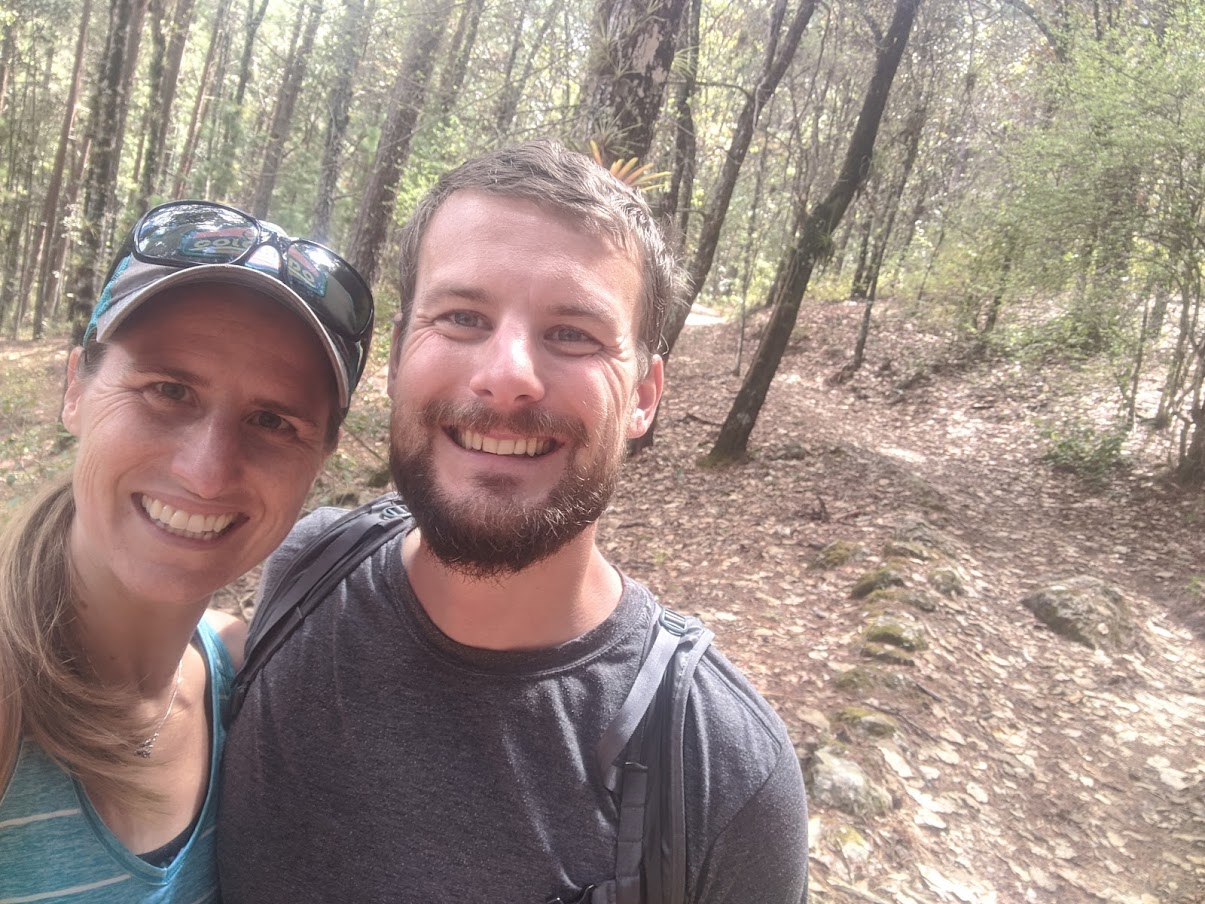Photo of Randi and Tyler in the middle of their hike