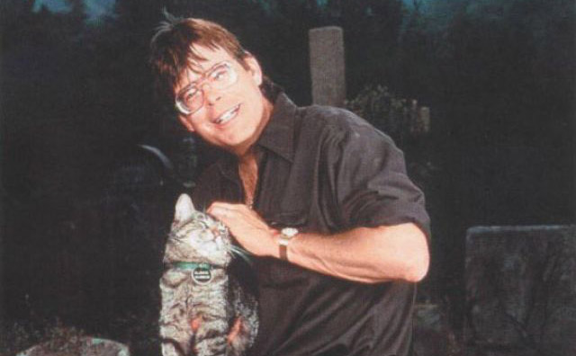 author stephen king holding a cat