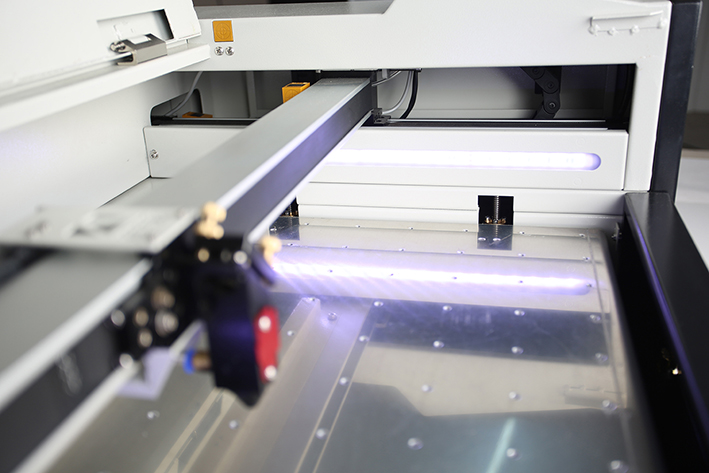 close up of laser bed on the Aeon Mira CO2 Desktop Laser Cutting Machine