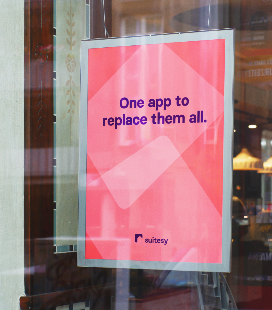Poster in window display with brand messaging