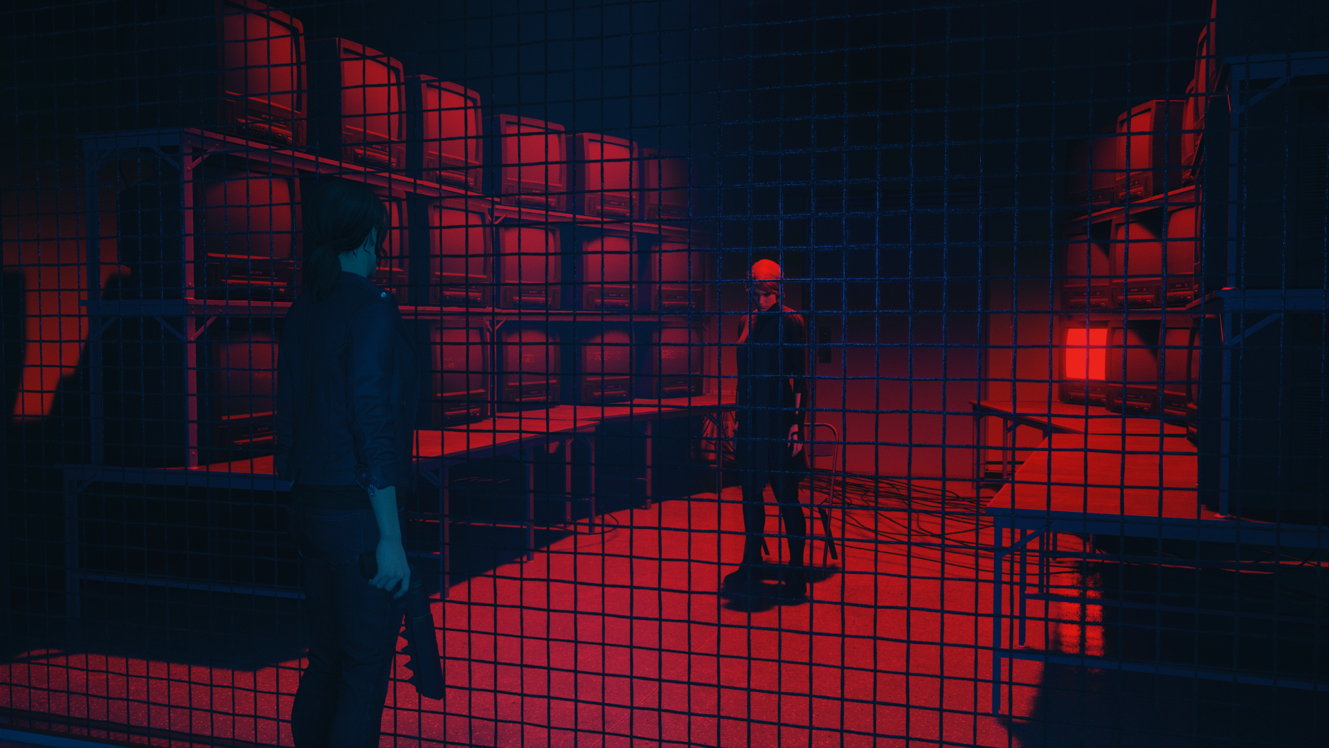 The player looking at a mirror version of herself, standing in a red-lit room.