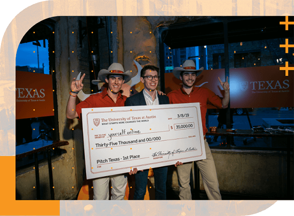 UT students presenting a student with a large check
