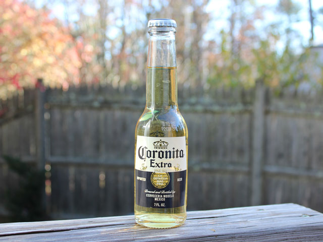 A bottle of Coronita Extra, an imported Mexican beer