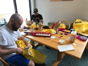 Pants, Fizz, and Huff make the Devo costumes in The Village at Loon Mountain