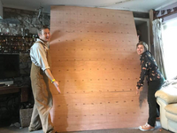 Chris and Jennie with large plywood board.