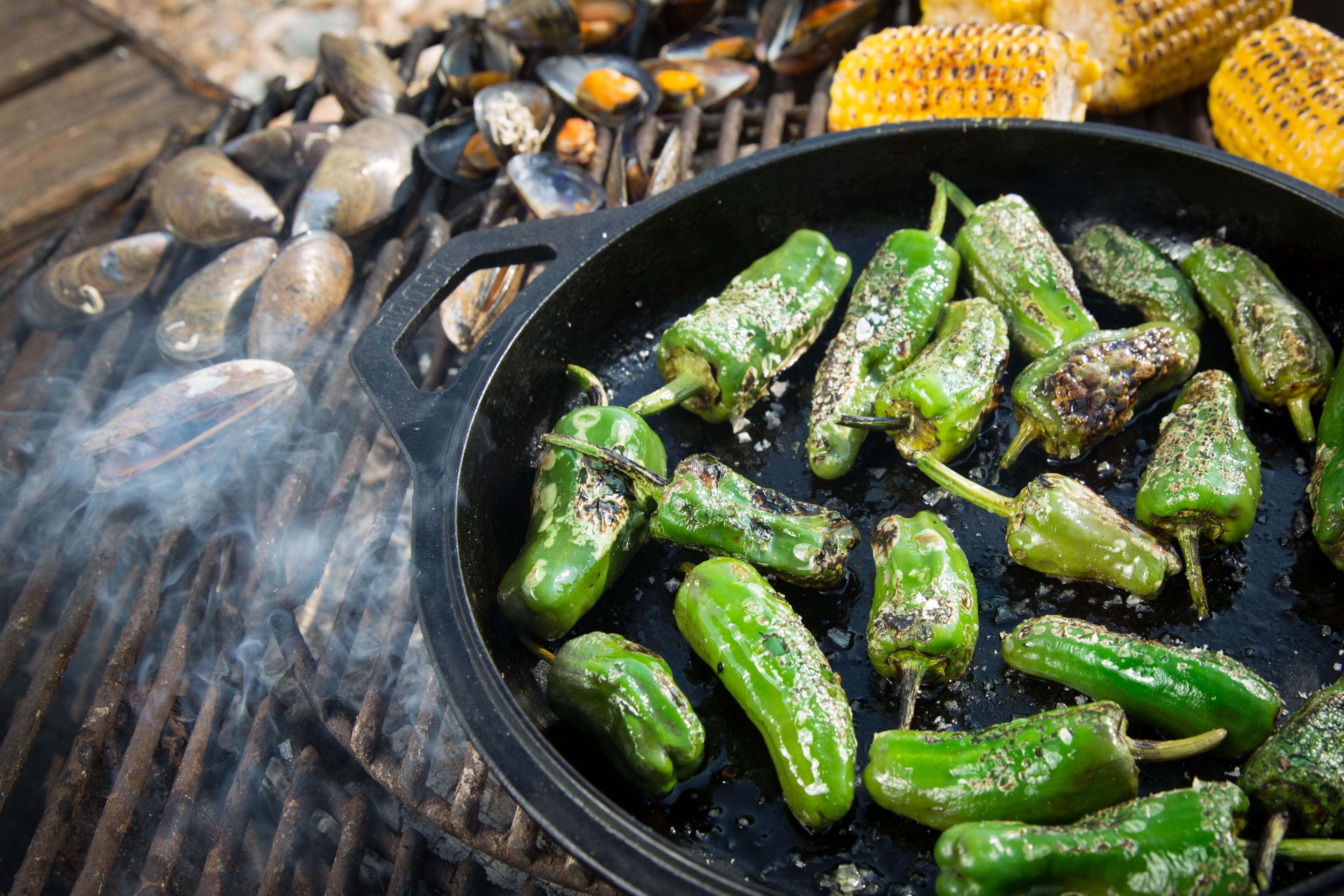 Mussels, corn and peppers cooking on the bbq.