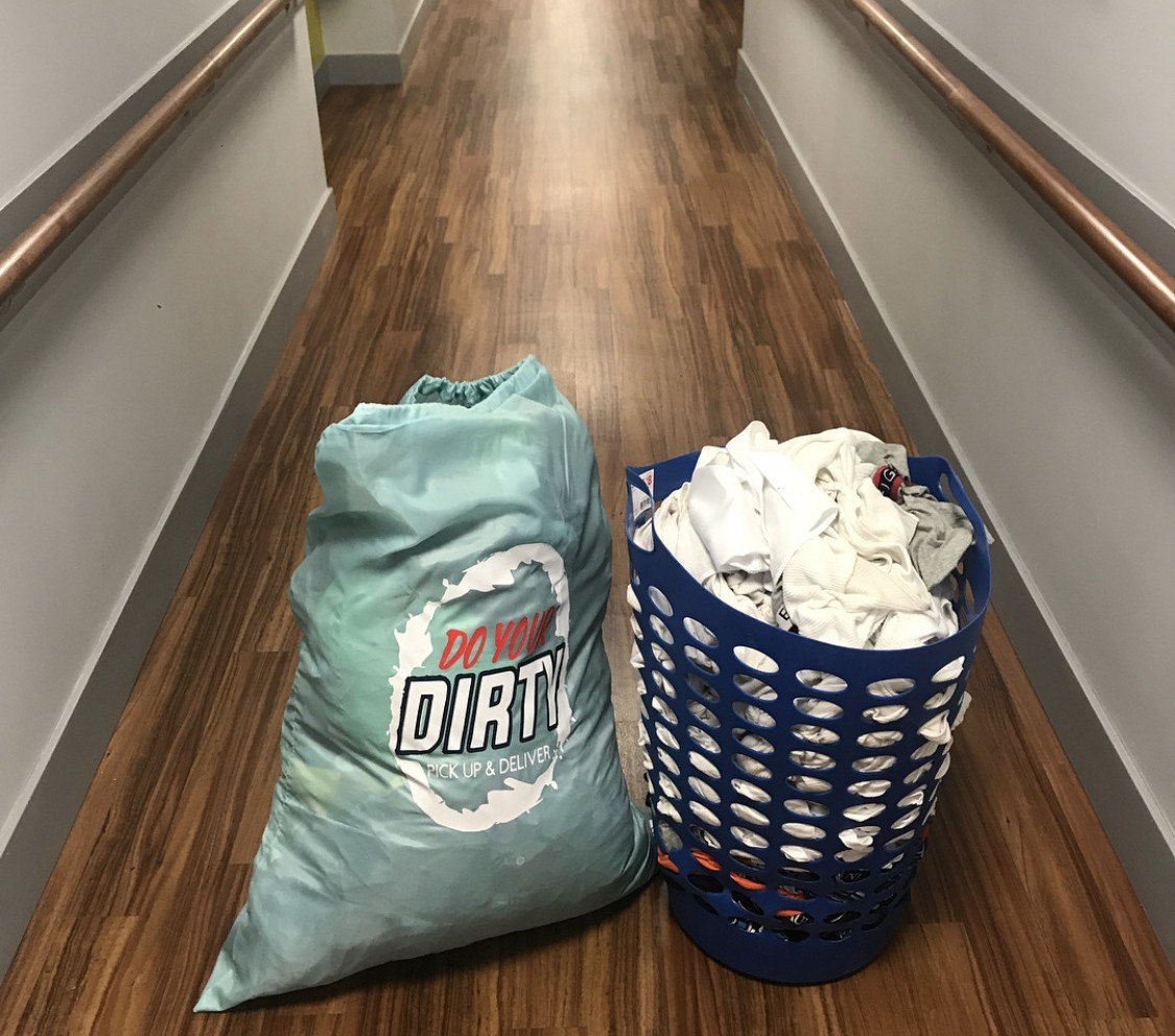 A bag and basket of laundry
