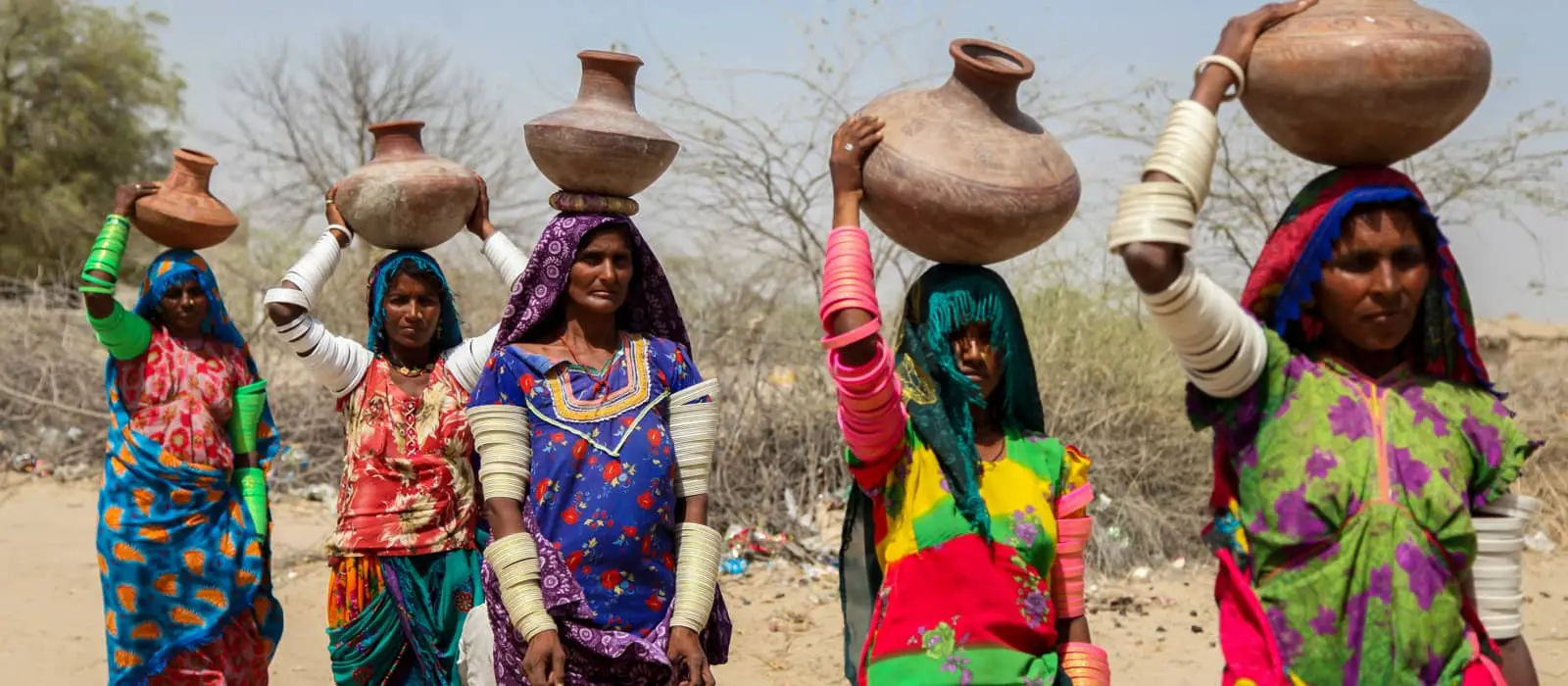 Women in Pakistan go to fetch water