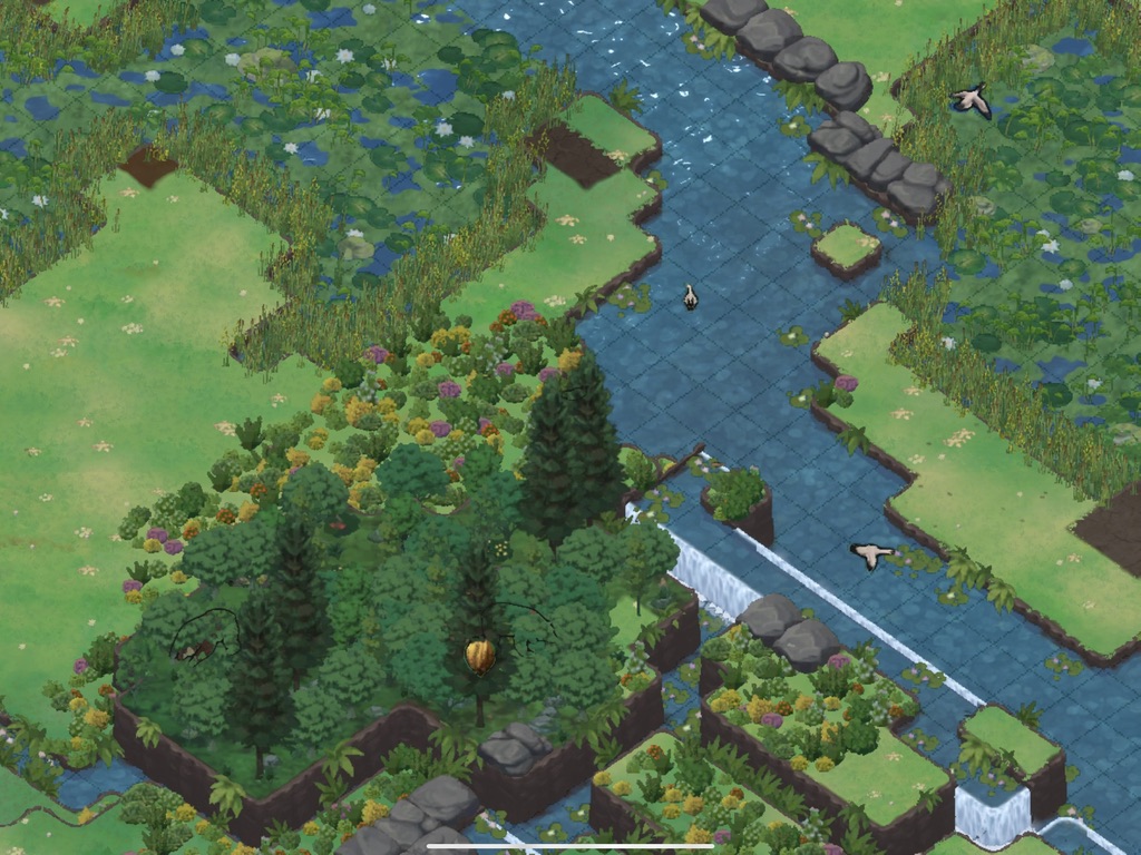 Game screenshot showing an overhead, isometric view of a river, surrounded by grass, wetlands, and forests.