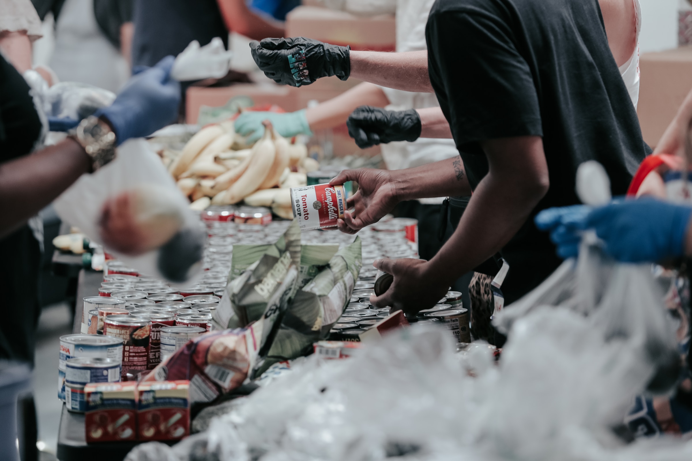 Image of people volunteering at a food pantry