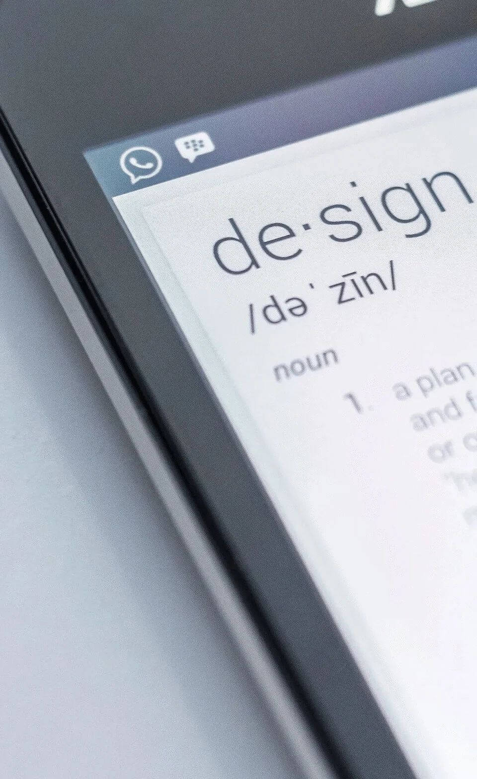 tablet displaying the dictionary definition of the word design