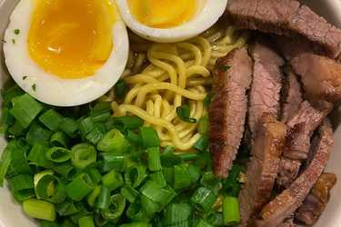 Beef noodle soup with jammy eggs