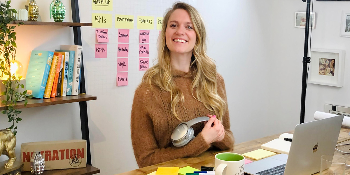 How to Conduct a Remote Design Thinking Workshop Brittni Bowering at her desk, ready to conduct a remote design thinking workshop