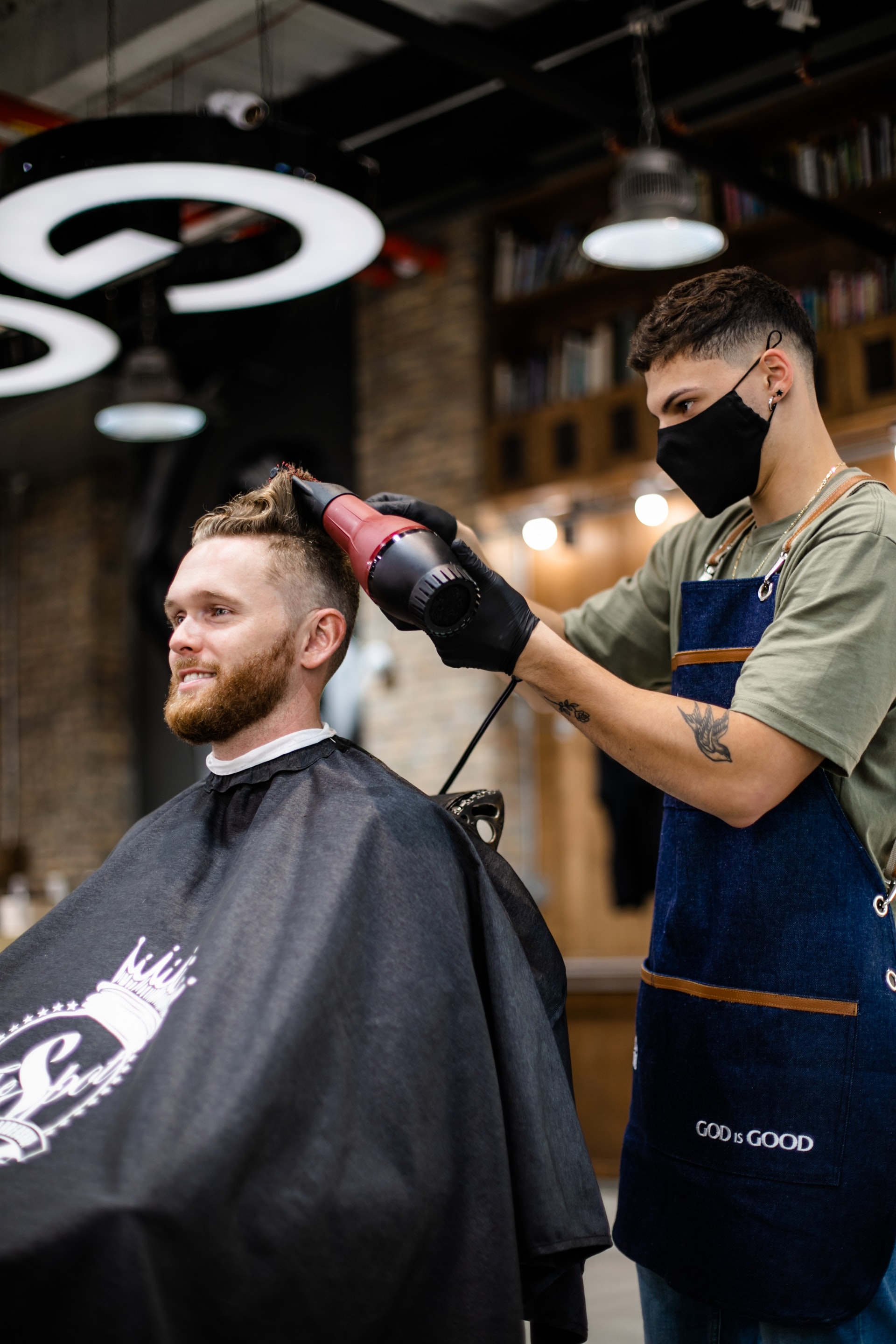 barber working on client's hair