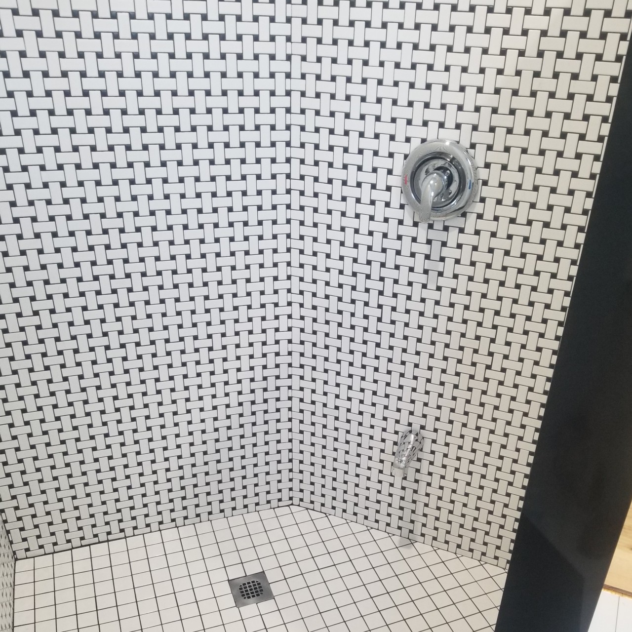 Custom bathroom floor and bathtub shower tiles