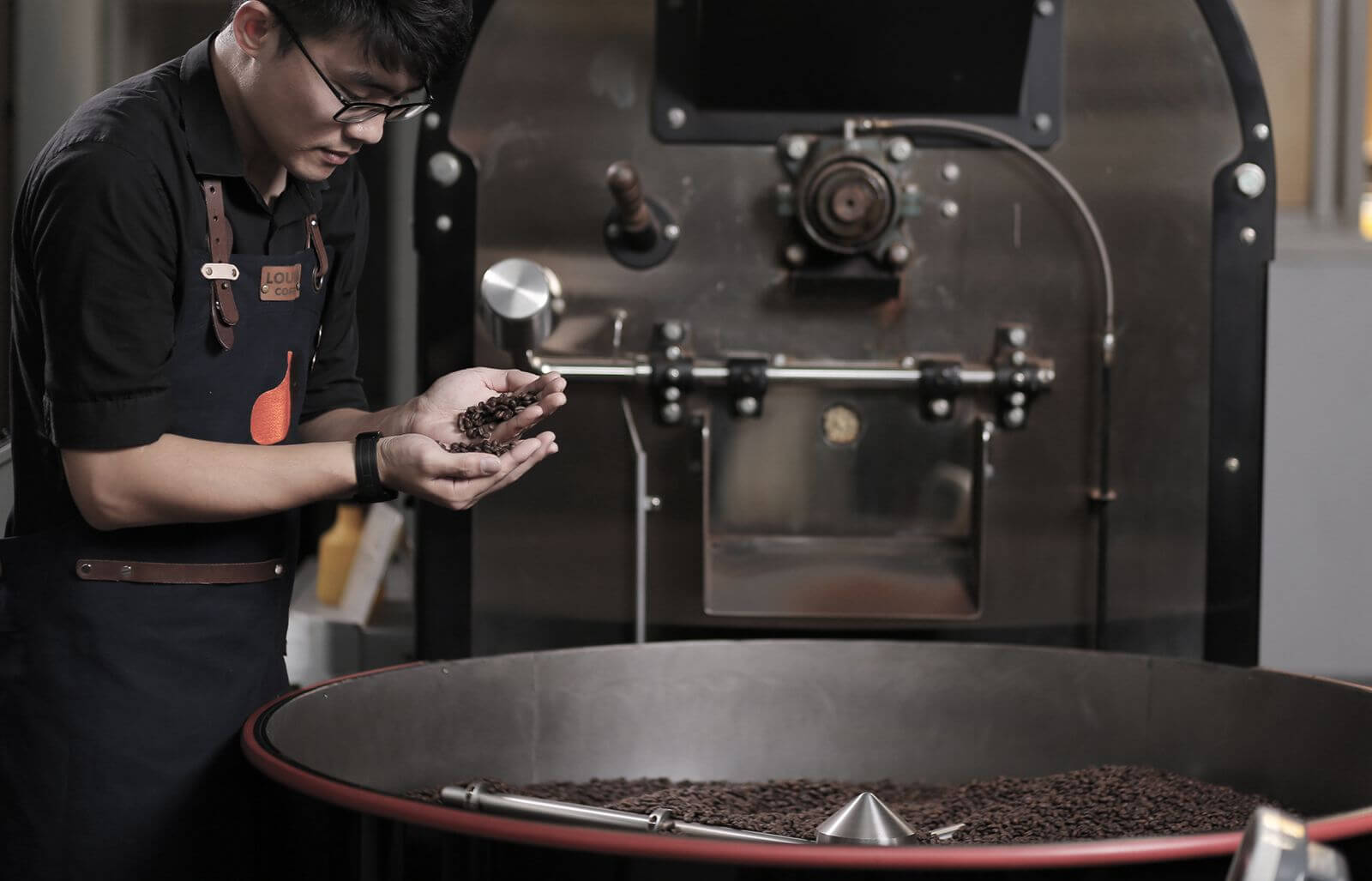 barista inspecting coffee beans