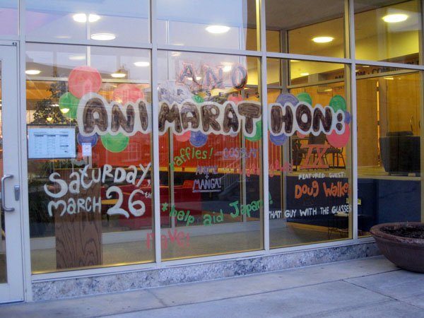 Animarathon IX announcements painted on the exterior windows Bowen Thompson Student Union.