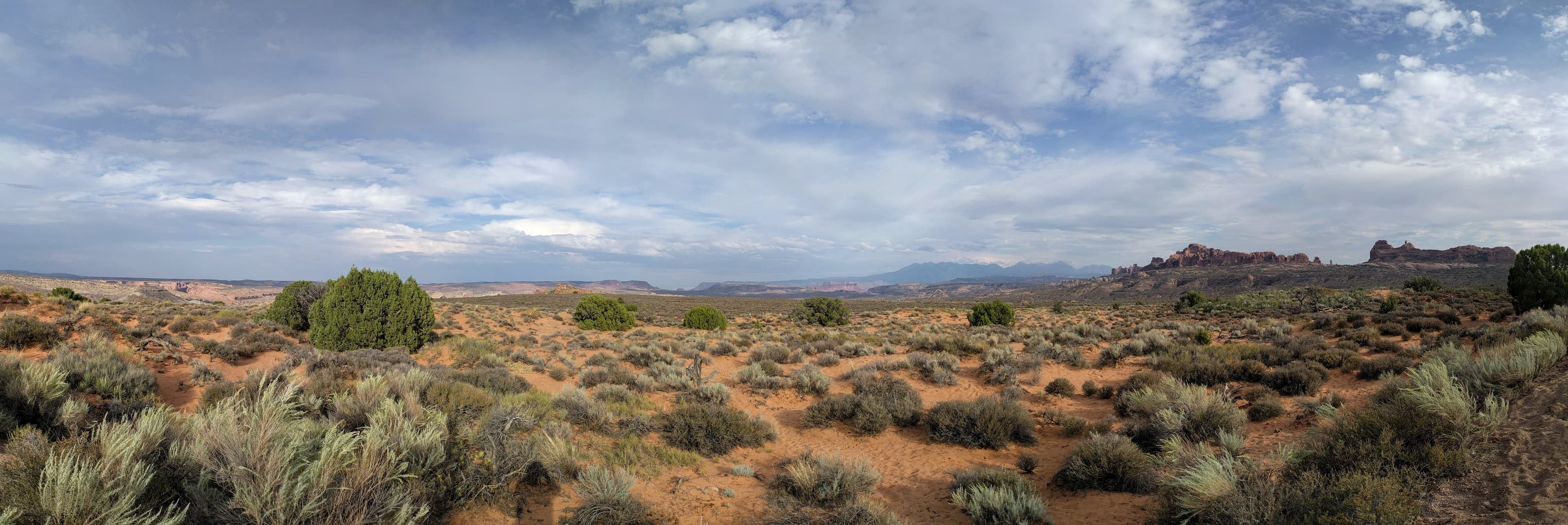 A desert panorama across Arches National Park.