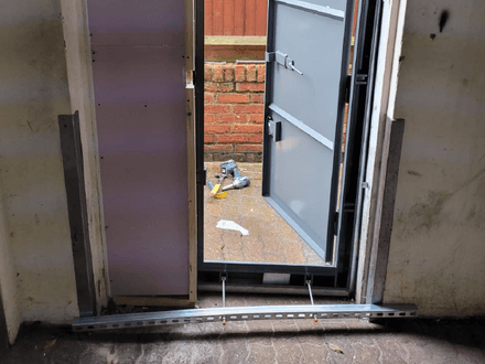 Securing Rear Door of Public House – London