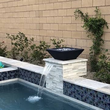 fountain installed in a nice blue pool