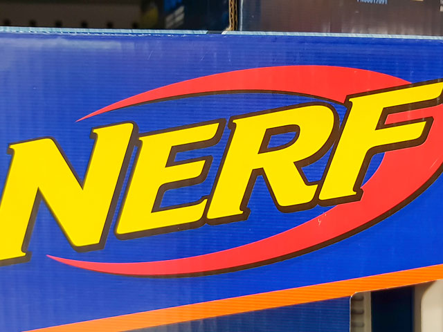 A Nerf Brand Box with Nerf Products Inside Of It