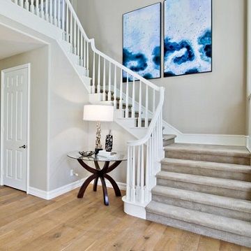 Grey walls with a white painted staircase