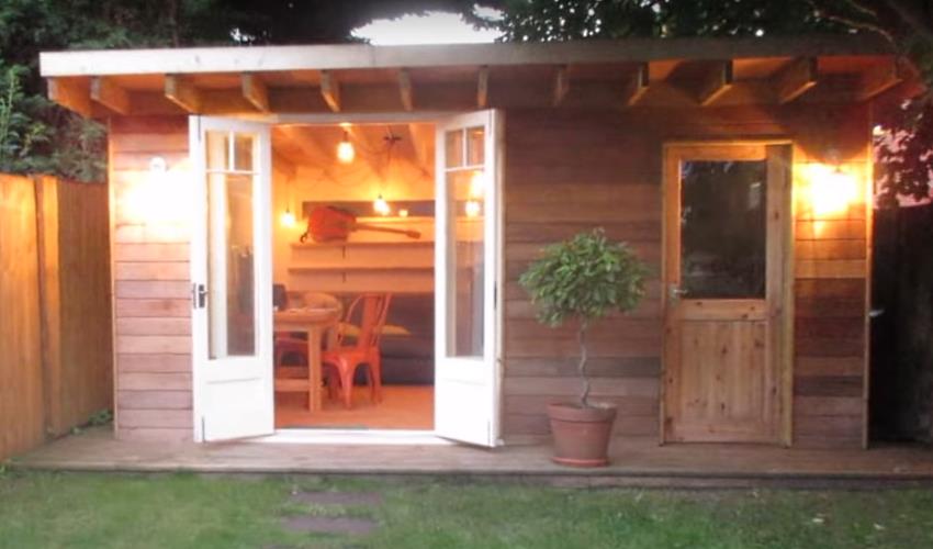 The man cave/she shed exterior which has two different entrances (the interiors are shown in the next pictures), one for living/working, and one for storage. The man cave/she shed exterior which has two different entrances (the interiors are shown in the next pictures), one for living/working, and one for storage.