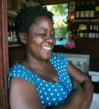 Lunes Duvil, a small business owner who has benefited from Concern's “Building Hope & Opportunities in Haiti” integrated urban program in Cité Soleil, Port au Prince. She says she has expanded and developed her range of products and the size of her shop, as a result of the program.