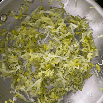 Sautee leeks in 1 tablespoon of butter over medium-low heat until soft, 10-15 minutes. Season with salt and pepper.