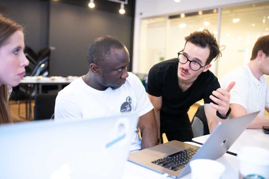 Swizec teaching a Serverless React workshop at Reactathon 2019