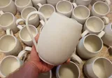 100 blank mugs by Matthew Freed