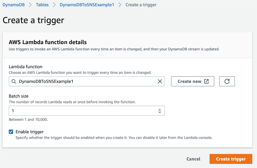 A screenshot showing the Create a trigger wizard for a DynamoDB Stream. This wizard asks for the Lambda function and Batch size between 1 and 10,000.