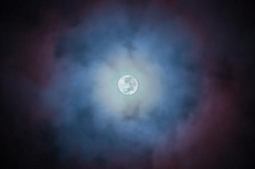 Full moon on blue night background