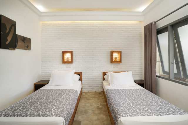 Casa Asia Twin rooms bed