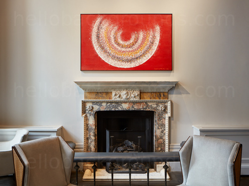 Ornate marble fireplace with overhanging contemporary art piece behind two modern styled grey chairs  Zoom background