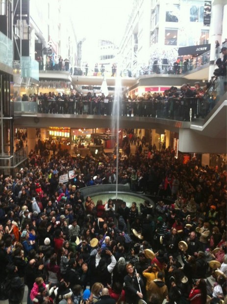 Marjorie Chan's stunning image of hundreds of Canadians setting an example in support of #idlenomore and Chief Theresa Spence at the Toronto Eaton Centre