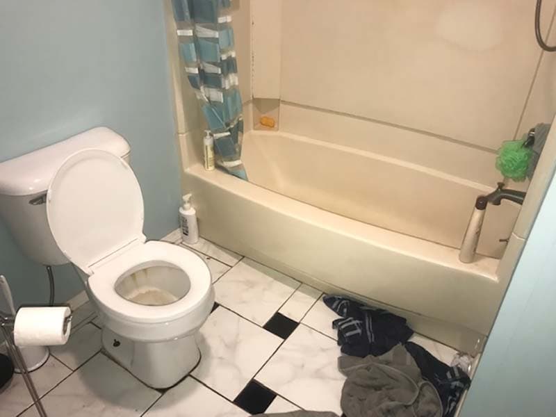 bathroom toilet and tub before a remodel by CorHome