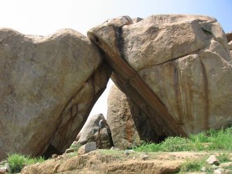 Two rocks leaning against each other