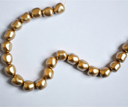Perle dorée baroque