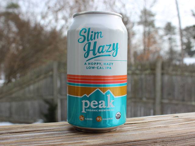 Slim Hazy, a Hoppy, Hazy Low-Cal IPA brewed by Peak Organic Brewing Company