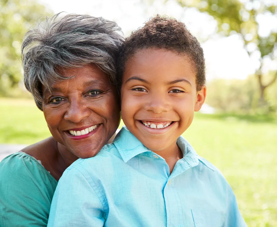 Woman with grandson smiling