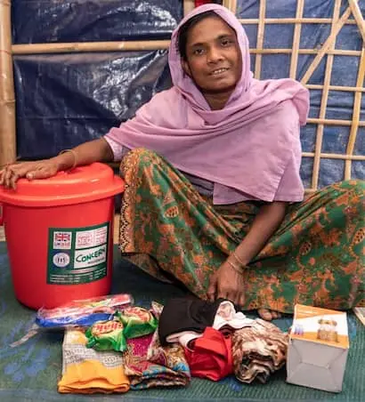 40-year-old woman receives a dignity kit from Concern.